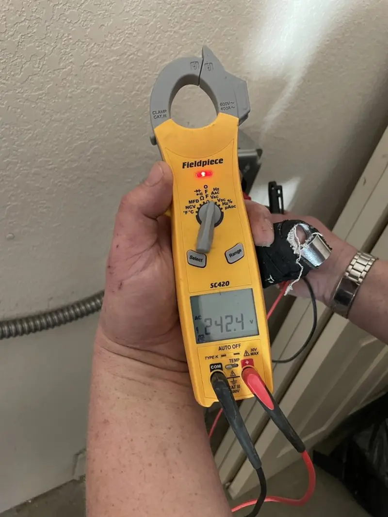 Voltage testing with clamp meter during Generator Installation in Middleburg